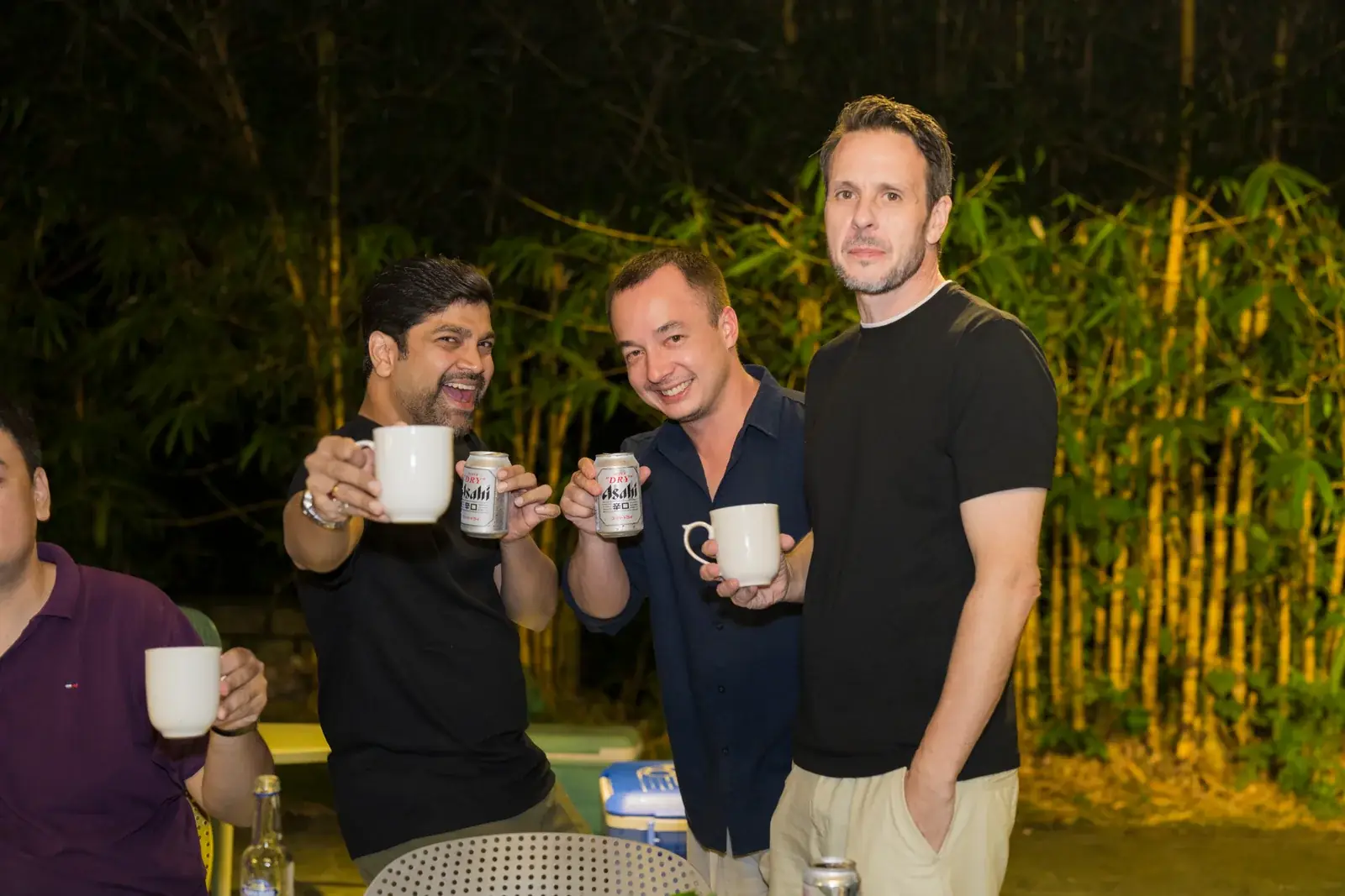 Sportkation participants sharing drinks and conversation in the evening at Soojin Resort