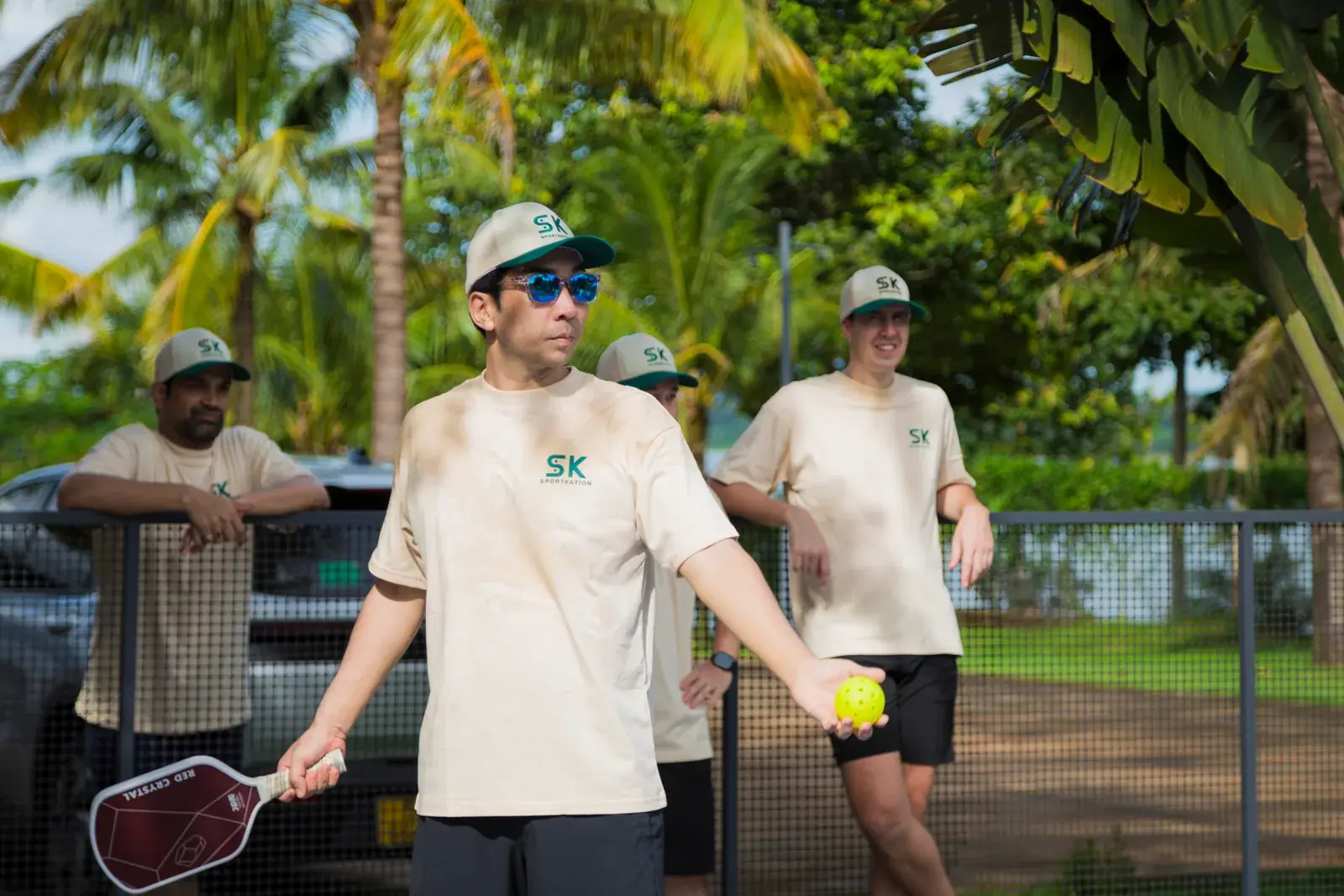 A coach guiding players during a Sportkation pickleball session