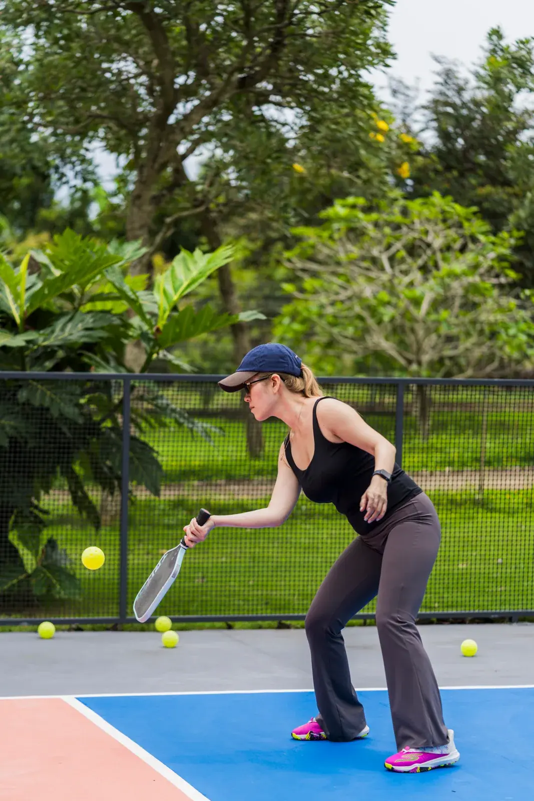 A player practising a pickleball serve at Soojin Resort